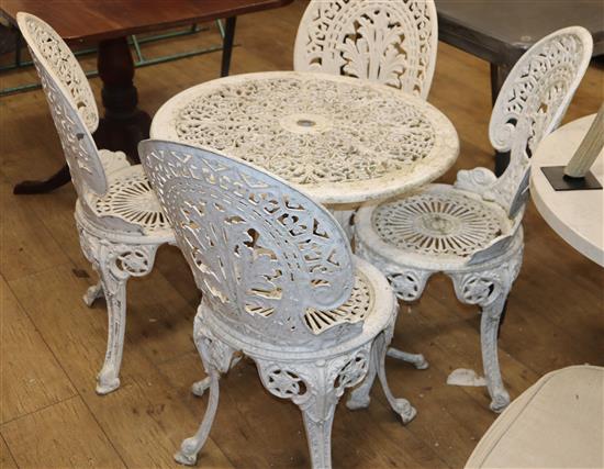 A painted aluminium circular garden table and four chairs table 68cm diameter